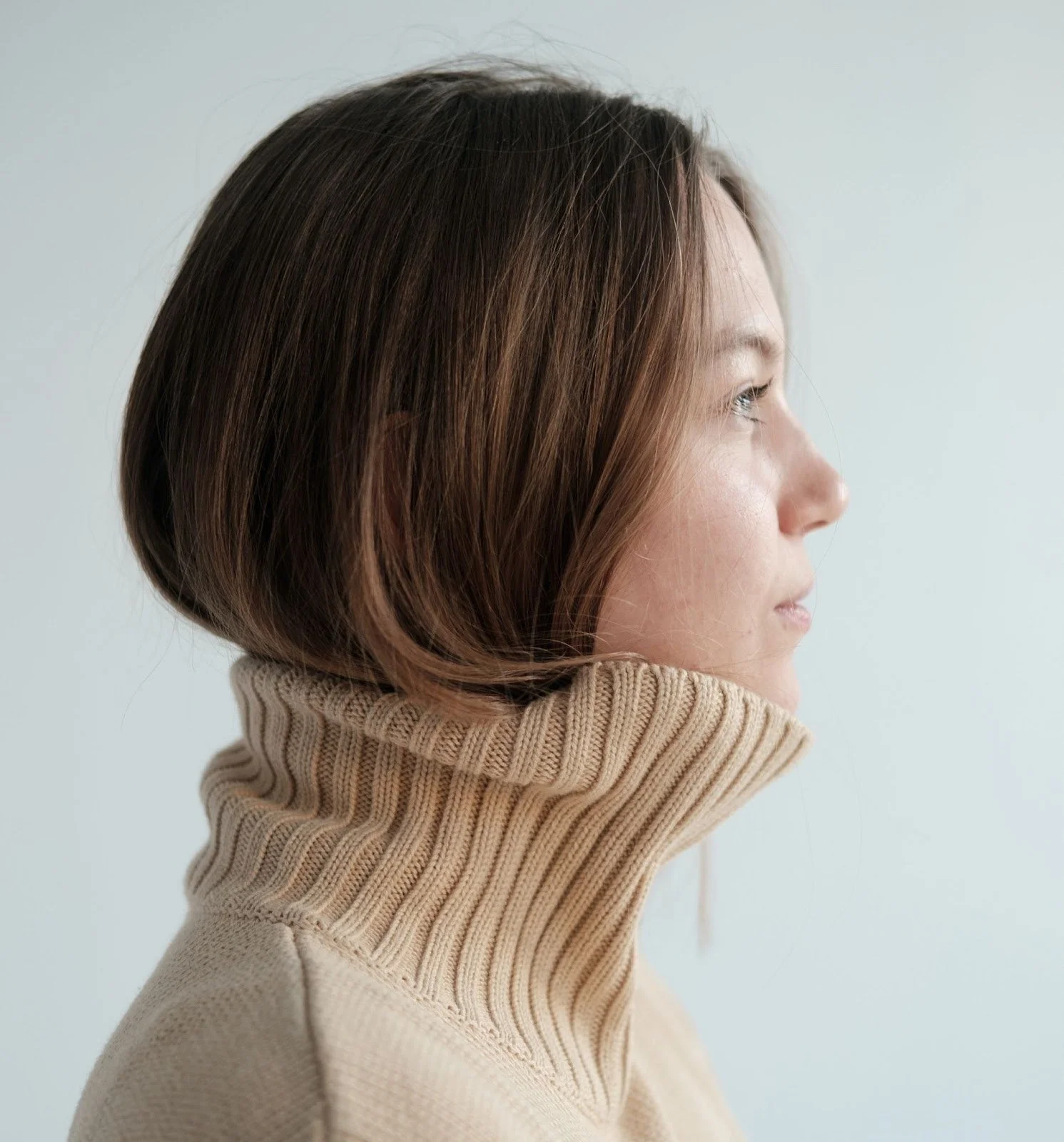 Profile of a woman in a sweater